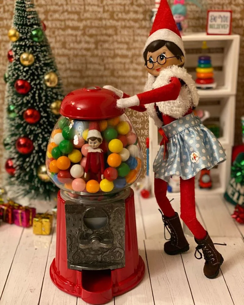 50 Last Minute Elf on the Shelf ideas-Falling into the Gumball Container