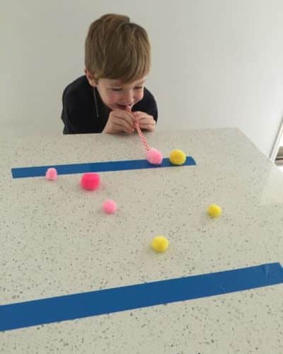 20 Christmas Minute to Win It Games FOR KIDS AND ADULTS-Pompom Puffer