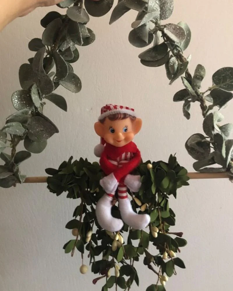 50 Last Minute Elf on the Shelf ideas-Swinging from the Mistletoe