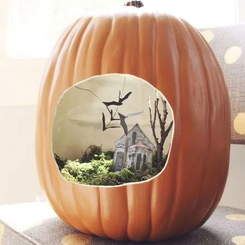 50 Best pumpkin carving ideas for Halloween and What type of pumpkin is used for Halloween?-Spooky Pumpkin Terrarium