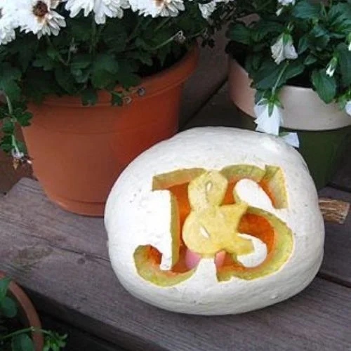 50 Best pumpkin carving ideas for Halloween and What type of pumpkin is used for Halloween?-Glittered Teal Pumpkin-pumpkin